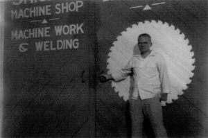 Carlton in front of Shickel Machine Shop
